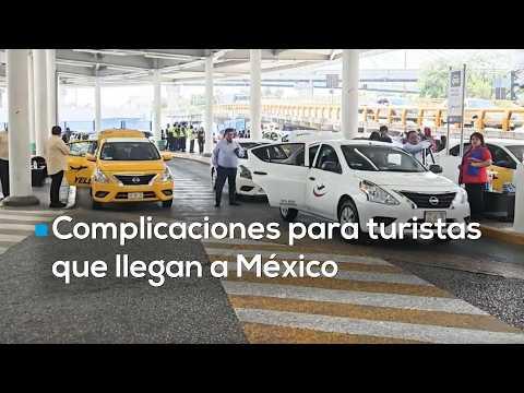 ¡Caos en el AICM! Falta de señalización y costos de taxis complican la llegada de turistas a México